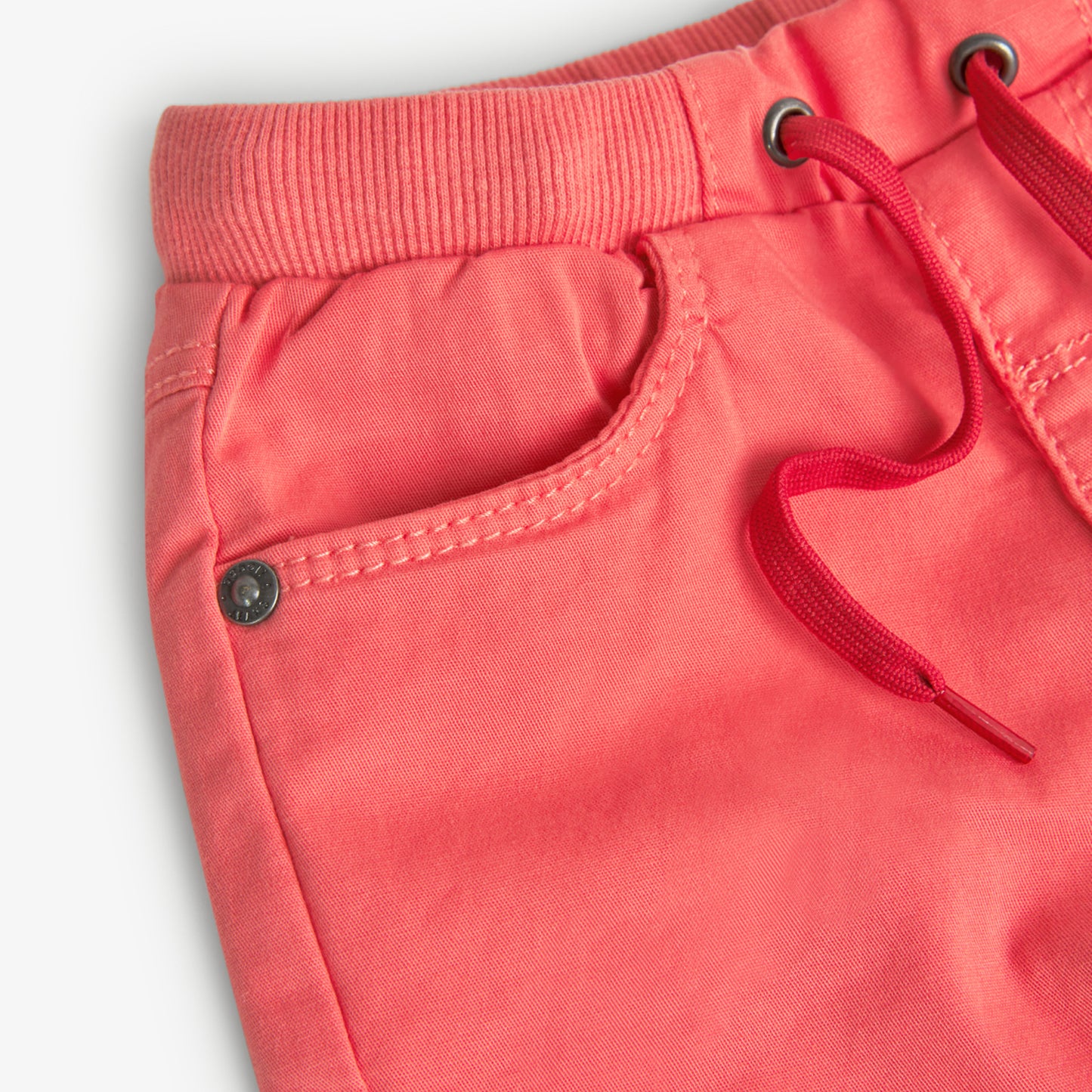 bermudas de niño Boboli color coral con goma y cordones en la cinturilla, bolsillos delante y detrás algodon