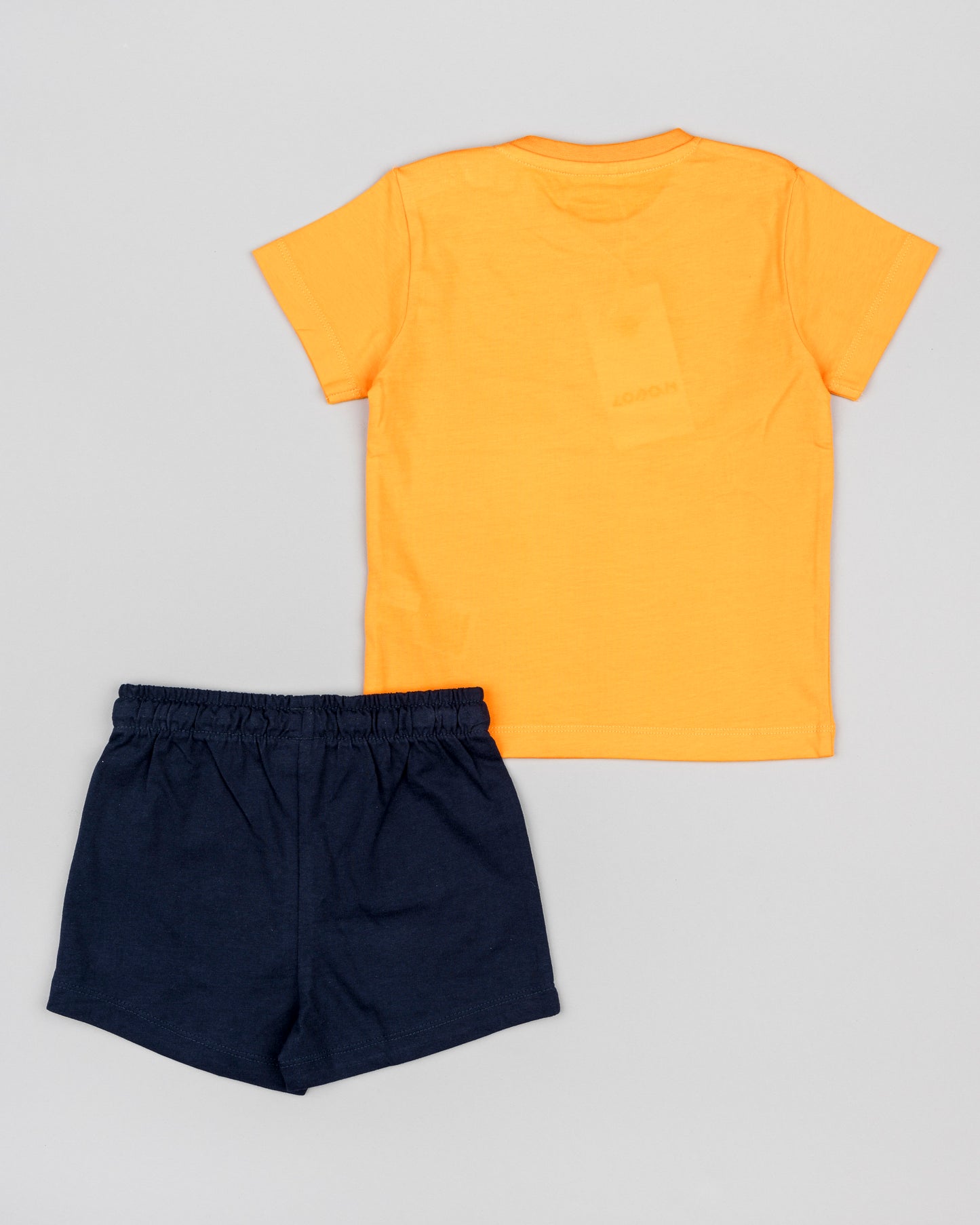 conjunto bebe niño Losan compuesto por camiseta de manga corta color naranja con leoncito estampado y bermudas color azul navy algodon Koskids