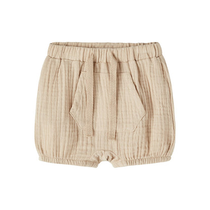 bermudas bebé algodón de tiro alto y bolsillo central en color camel