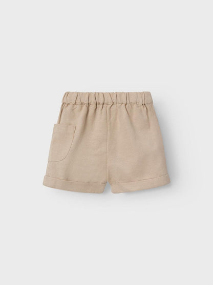 Bermudas de bebe niño Name It color camel tejido Lenzing EcoVero, lino y algodon Koskids