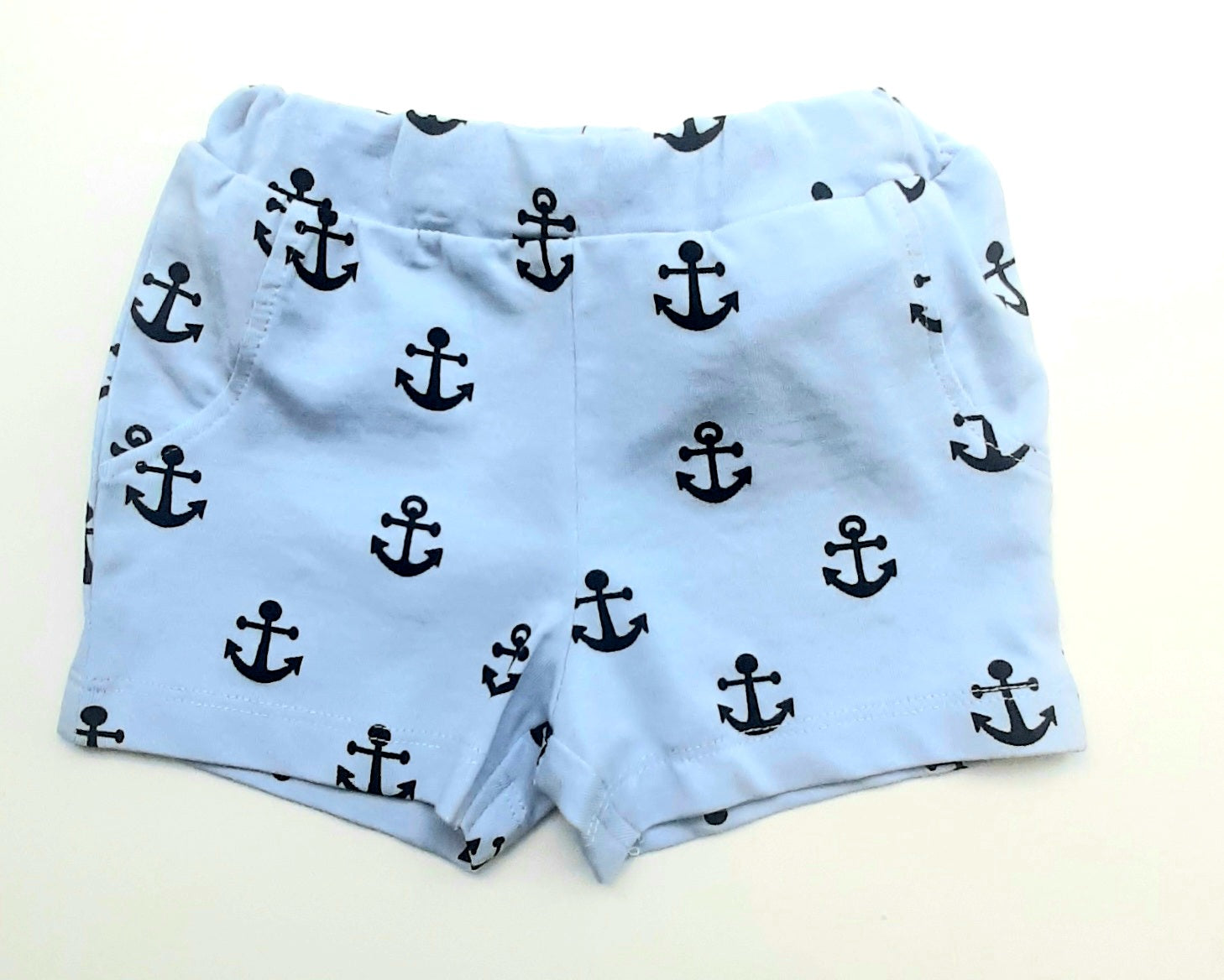 bermudas de bebé color azul claro estampado de anchas por toda la prenda con goma en la cinturilla y botones interiores para ajustar, algodon organico Name It