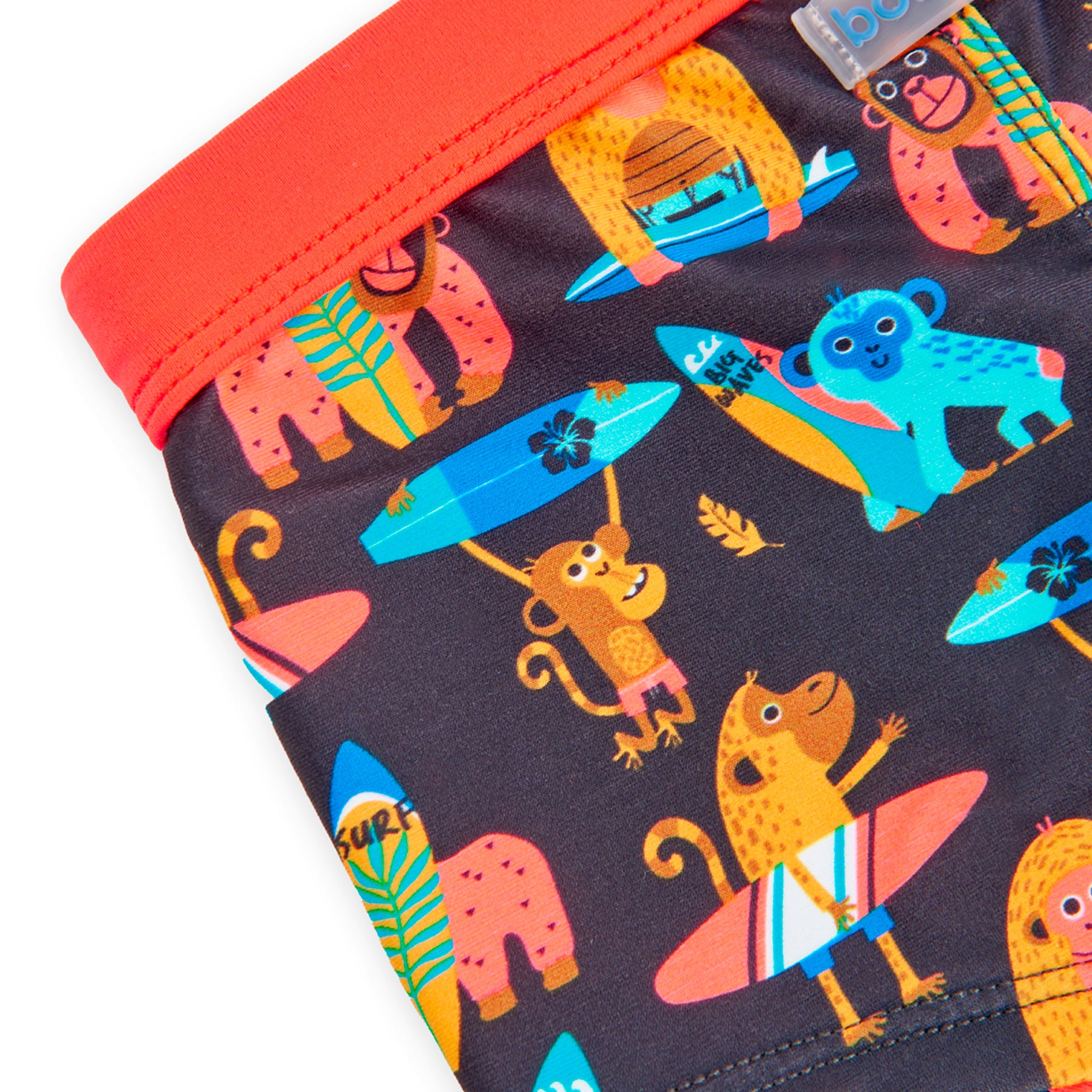 bañador niño tipo boxer con cordones estampado de monos en colores naranja azules y negro Boboli