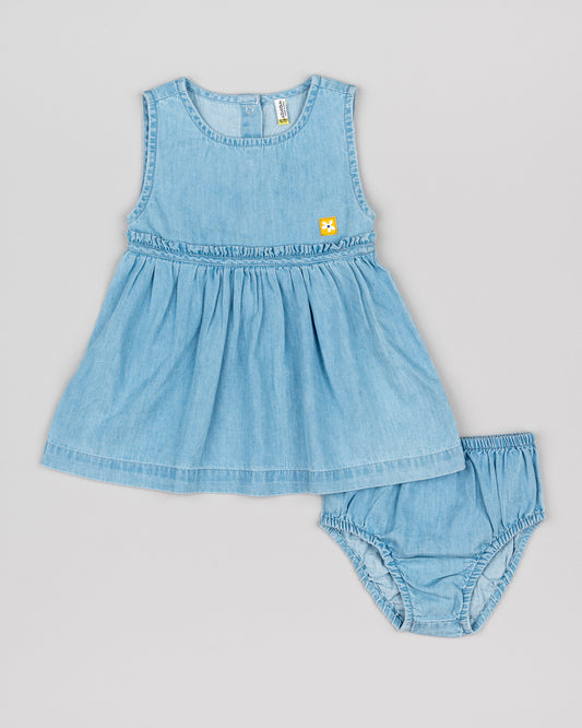 Vestido bebe denim sin mangas con cubrepañal del mismo tejido corte en la cintura cuello redondo y botones en la espalda Losan Koskids