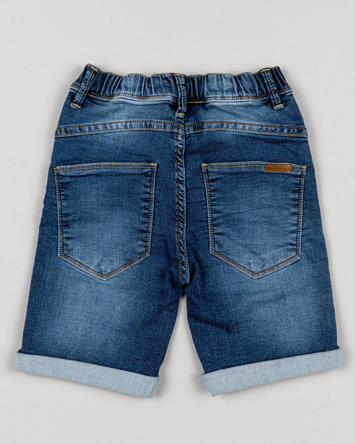 bermudas denim niño Losan con goma y botones interiores bolsillos delante y detras y dobladillo en el bajo Koskids