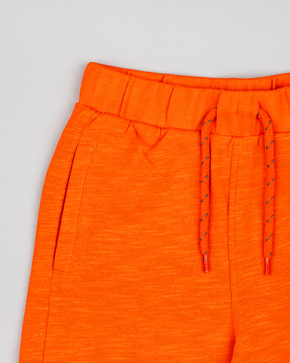 Bermudas de niño Losan color naranja con goma en la cinturilla