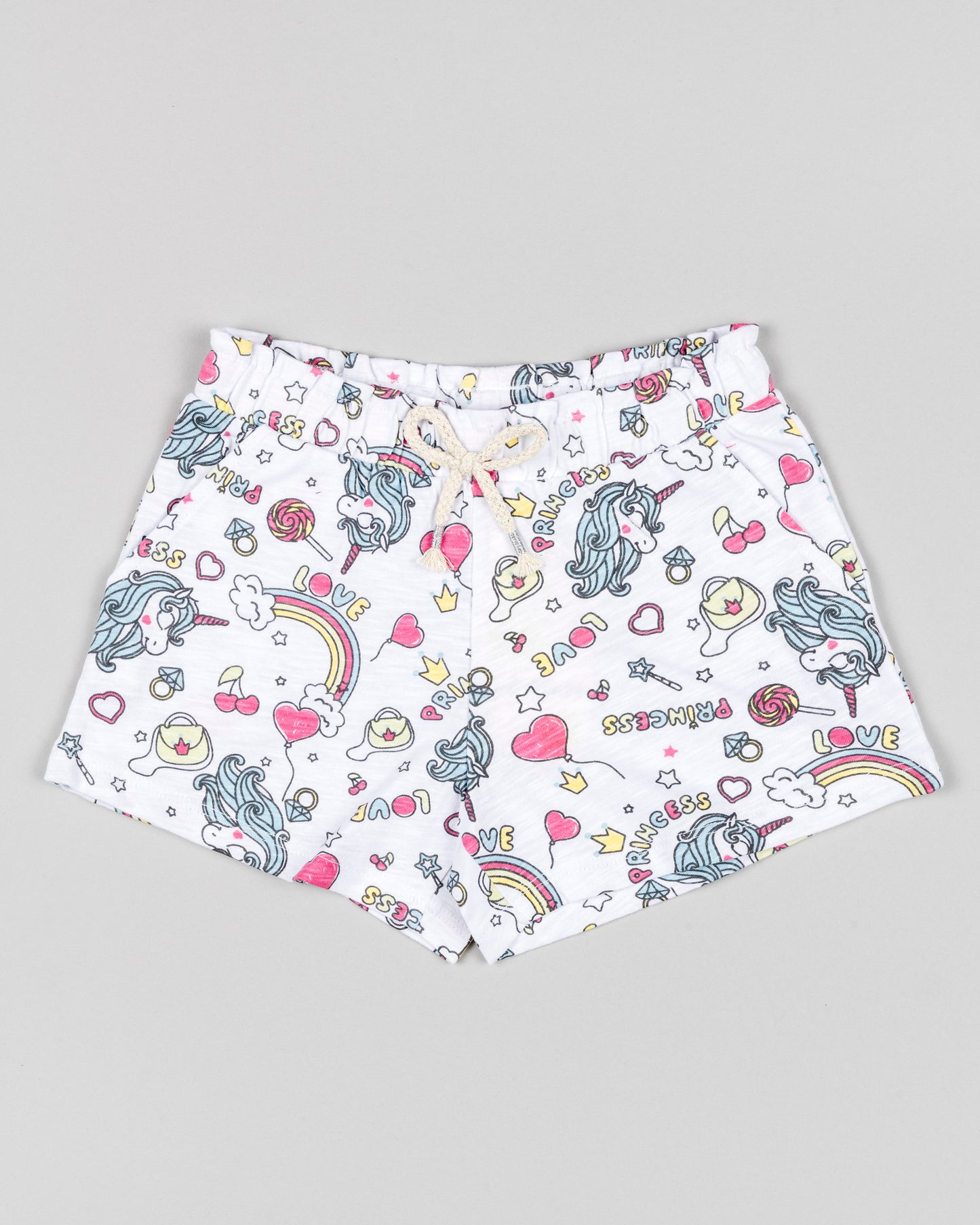 short de niña fondo blanco con estampado de unicornios y arcoiris goma y cordones en la cintura Losan Koskids