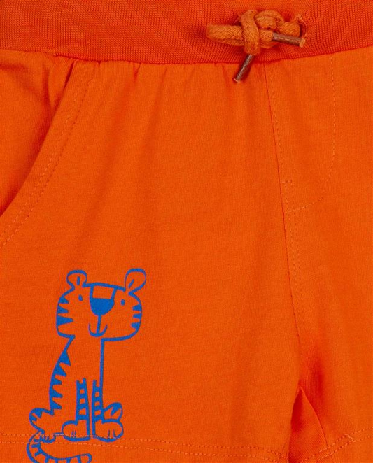 Bermudas tipo chandal de bebé color naranja con un tigre estampado y bolsillos laterales Losan