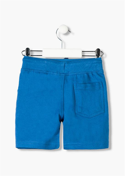 Bermudas tipo chandal de bebé con cinturilla ajustable con goma y cordones en color azul con letras oscuras en la pierna Losan